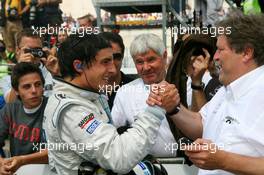 24.06.2007 Nürnberg, Germany,  Norbert Haug (GER), Sporting Director Mercedes-Benz (right), congraqtulates Bruno Spengler (CDN), Team HWA AMG Mercedes, Portrait (1st, left), with his victory - DTM 2007 at Norisring