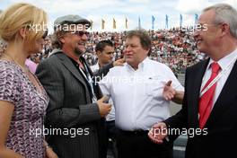24.06.2007 Nürnberg, Germany,  Veronica Ferres (GER), Actrice, with husband Helmut Dietl (GER), Director, with Norbert Haug (GER), Sporting Director Mercedes-Benz (center) and Prof Dr Martin Winterkorn (GER), Chairman of the Board of Volkswagen AG (right) - DTM 2007 at Norisring