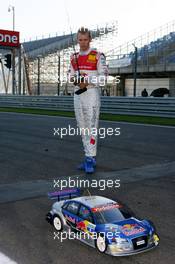 27.07.2007 Zandvoort, The Netherlands,  Mattias Ekström (SWE), Audi Sport Team Abt Sportsline, having a go with the electric RC car of Martin Tomczyk (GER) - DTM 2007 at Circuit Park Zandvoort