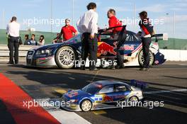 27.07.2007 Zandvoort, The Netherlands,  Martin Tomczyk (GER), with an electric RC car, races against his team mate Mattias Ekström (SWE), in a real Audi A4 DTM car - DTM 2007 at Circuit Park Zandvoort