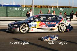 27.07.2007 Zandvoort, The Netherlands,  Martin Tomczyk (GER), with an electric RC car, races against his team mate Mattias Ekström (SWE), in a real Audi A4 DTM car. The DTM car won.... just! - DTM 2007 at Circuit Park Zandvoort