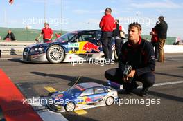 27.07.2007 Zandvoort, The Netherlands,  Martin Tomczyk (GER), with an electric RC car, races against his team mate Mattias Ekström (SWE), in a real Audi A4 DTM car - DTM 2007 at Circuit Park Zandvoort