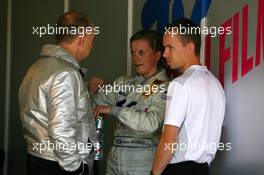 27.07.2007 Zandvoort, The Netherlands,  Susie Stoddart (GBR), Mücke Motorsport AMG Mercedes, Portrait (center), talking with Peter Mücke (GER), Team Owner Mücke Motorsport (left) and James Goodfield (GBR), Race Engineer of Susie Stoddart (right) - DTM 2007 at Circuit Park Zandvoort