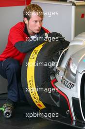 28.07.2007 Zandvoort, The Netherlands,  Audi mechanic with a front tyre - DTM 2007 at Circuit Park Zandvoort