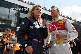 28.07.2007 Zandvoort, The Netherlands,  Timo Scheider (GER), Audi Sport Team Abt Sportsline, Audi A4 DTM gets the poleposition at DTM Zandvoort. The happy driver received many congratulations on his poleposition. Here he is interviewed by Christina Surer. - DTM 2007 at Circuit Park Zandvoort