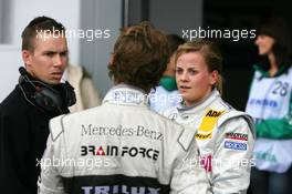 01.09.2007 Nürburg, Germany,  Susie Stoddart (GBR), Mücke Motorsport AMG Mercedes, Portrait (right), talking with Mathias Lauda (AUT), Mücke Motorsport AMG Mercedes. Left: James Goodfield (GBR), Race Engineer of Susie Stoddart - DTM 2007 at Nürburgring