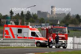 01.09.2007 Nürburg, Germany,  Local assistence cars and firetruck. In the background the Nürburgring castle. - DTM 2007 at Nürburgring