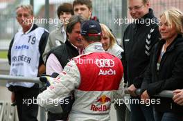 01.09.2007 Nürburg, Germany,  Hermann Tomczyk (GER), ADAC Sport President, congratulates his son Martin Tomczyk (GER), Audi Sport Team Abt Sportsline, with pole position - DTM 2007 at Nürburgring
