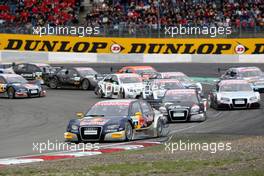 02.09.2007 Nürburg, Germany,  Start of the race Martin Tomczyk (GER), Audi Sport Team Abt Sportsline, Audi A4 DTM leads the field after first corner. - DTM 2007 at Nürburgring