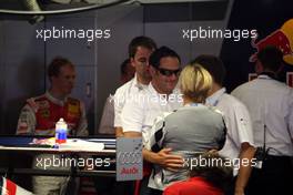 22.09.2007 Barcelona, Spain,  Hans-Jurgen Abt (GER), Teamchef Abt-Audi is greeting Tina Thörner (SWE), girlfriend of Mattias Ekström (SWE) welcome inside the pitbox. - DTM 2007 at Circuit de Catalunya