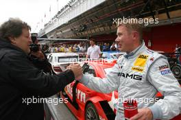 22.09.2007 Barcelona, Spain,  Norbert Haug (GER), Sporting Director Mercedes-Benz. congratulates Mika Häkkinen (FIN), Team HWA AMG Mercedes, Portrait, with his second place - DTM 2007 at Circuit de Catalunya
