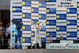 23.09.2007 Barcelona, Spain,  Racewinner Jamie Green (GBR), Team HWA AMG Mercedes, AMG Mercedes C-Klasse walks on the podium. - DTM 2007 at Circuit de Catalunya