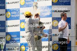 23.09.2007 Barcelona, Spain,  racewinner Jamie Green (GBR), Team HWA AMG Mercedes, AMG Mercedes C-Klasse in the middle of the champagne shower. On the right Gerhard Ungar (GER), Chief Designer AMG - DTM 2007 at Circuit de Catalunya