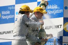 23.09.2007 Barcelona, Spain,  Podium, race winner Jamie Green (GBR), Team HWA AMG Mercedes, Portrait, gets a champaign shower - DTM 2007 at Circuit de Catalunya