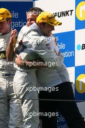 23.09.2007 Barcelona, Spain,  Podium, Gerhard Ungar (GER), Chief Designer AMG, congratulates Jamie Green (GBR), Team HWA AMG Mercedes, Portrait (1st) - DTM 2007 at Circuit de Catalunya