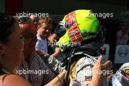 23.09.2007 Barcelona, Spain,  Race winner Jamie Green (GBR), Team HWA AMG Mercedes, AMG Mercedes C-Klasse, receives congratulations from his parents - DTM 2007 at Circuit de Catalunya