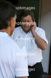 23.09.2007 Barcelona, Spain,  Norbert Haug (GER), Sporting Director Mercedes-Benz, making a telephone call with Mercedes-Benz executives after Audi withdrawed all cars from the race - DTM 2007 at Circuit de Catalunya