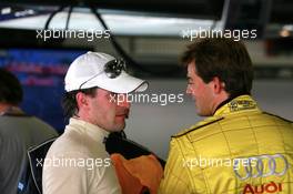 23.09.2007 Barcelona, Spain,  Marcus Winkelhock (GER), TME, Portrait, talking with a mechanic after Audi withdrawed all cars from the race - DTM 2007 at Circuit de Catalunya
