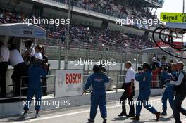 23.09.2007 Barcelona, Spain,  Dr. Wolfgang Ullrich (GER), Audi's Head of Sport, walks towards Norbert Haug (GER), Sporting Director Mercedes-Benz, after Audi withdrawed all cars from the race - DTM 2007 at Circuit de Catalunya