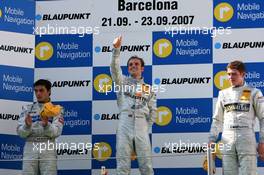 23.09.2007 Barcelona, Spain,  Podium, Jamie Green (GBR), Team HWA AMG Mercedes, Portrait (1st, center), Bruno Spengler (CDN), Team HWA AMG Mercedes, Portrait (2nd, left), Paul di Resta (GBR), Persson Motorsport AMG Mercedes, Portrait (3rd, right). - DTM 2007 at Circuit de Catalunya
