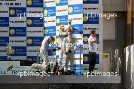 23.09.2007 Barcelona, Spain,  Racewinner Jamie Green (GBR), Team HWA AMG Mercedes, AMG Mercedes C-Klasse being sprayed on with champagne at the podium. - DTM 2007 at Circuit de Catalunya