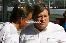 23.09.2007 Barcelona, Spain,  Norbert Haug (GER), Sporting Director Mercedes-Benz, talking with Wolfgang Schatling (GER), Press Officer Mercedes-Benz Motorsport, after Audi withdrawed all cars from the race - DTM 2007 at Circuit de Catalunya