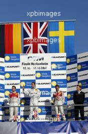 14.10.2007 Hockenheim, Germany,  The Hockenheim podium: (middle) 1st Jamie Green (GBR), Team HWA AMG Mercedes, AMG Mercedes C-Klasse; (left) 2nd Timo Scheider (GER), Audi Sport Team Abt Sportsline, Audi A4 DTM; (right) 3rd Mattias Ekström (SWE), Audi Sport Team Abt Sportsline, Audi A4 DTM - DTM 2007 at Hockenheimring