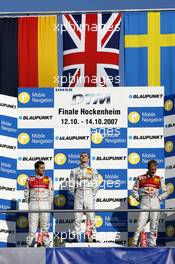 14.10.2007 Hockenheim, Germany,  The Hockenheim podium: (middle) 1st Jamie Green (GBR), Team HWA AMG Mercedes, AMG Mercedes C-Klasse; (left) 2nd Timo Scheider (GER), Audi Sport Team Abt Sportsline, Audi A4 DTM; (right) 3rd Mattias Ekström (SWE), Audi Sport Team Abt Sportsline, Audi A4 DTM - DTM 2007 at Hockenheimring