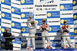 14.10.2007 Hockenheim, Germany,  The DTM 2007 championship podium: (middle) 1st Mattias Ekström (SWE), Audi Sport Team Abt Sportsline, Audi A4 DTM; (left) 2nd Bruno Spengler (CDN), Team HWA AMG Mercedes, AMG Mercedes C-Klasse; (right) 3rd Martin Tomczyk (GER), Audi Sport Team Abt Sportsline, Audi A4 DTM - DTM 2007 at Hockenheimring