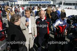 14.10.2007 Hockenheim, Germany,  Live television interview of the ARD by Claus Lufen (middle). ( left) Norbert Haug (GER), Sporting Director Mercedes-Benz and (right) Dr. Wolfgang Ullrich (GER), Audi's Head of Sport. - DTM 2007 at Hockenheimring