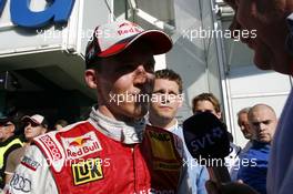 14.10.2007 Hockenheim, Germany,  Mattias Ekström (SWE), Audi Sport Team Abt Sportsline, Audi A4 DTM being interviewed by Swedish television. - DTM 2007 at Hockenheimring