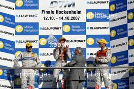 14.10.2007 Hockenheim, Germany,  The DTM 2007 championship podium: (middle) 1st Mattias Ekström (SWE), Audi Sport Team Abt Sportsline, Audi A4 DTM; (left) 2nd Bruno Spengler (CDN), Team HWA AMG Mercedes, AMG Mercedes C-Klasse; (right) 3rd Martin Tomczyk (GER), Audi Sport Team Abt Sportsline, Audi A4 DTM - DTM 2007 at Hockenheimring