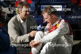 14.10.2007 Hockenheim, Germany,  (right) Mattias Ekström (SWE), Audi Sport Team Abt Sportsline, Audi A4 DTM being interviewed by (left) Claus Lufen of the ARD. - DTM 2007 at Hockenheimring