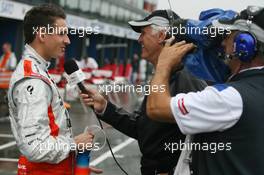 16.03.2007 Melbourne, Australia,  Adrian Sutil (GER), Spyker F1 Team, is interviewed by TV - Formula 1 World Championship, Rd 1, Australian Grand Prix, Friday Practice