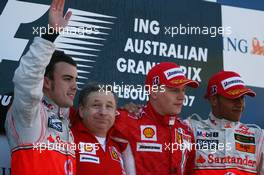 18.03.2007 Melbourne, Australia,  2nd place Fernando Alonso (ESP), McLaren Mercedes with Jean Todt (FRA), Scuderia Ferrari, Ferrari CEO, 1st place Kimi Raikkonen (FIN), Räikkönen, Scuderia Ferrari and 3rd place Lewis Hamilton (GBR), McLaren Mercedes - Formula 1 World Championship, Rd 1, Australian Grand Prix, Sunday Podium