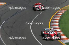 18.03.2007 Melbourne, Australia,  Jarno Trulli (ITA), Toyota Racing, TF107 and Takuma Sato (JPN), Super Aguri F1, SA07 - Formula 1 World Championship, Rd 1, Australian Grand Prix, Sunday Race
