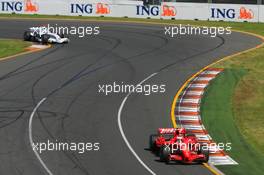 18.03.2007 Melbourne, Australia,  Kimi Raikkonen (FIN), Räikkönen, Scuderia Ferrari, F2007 and Nick Heidfeld (GER), BMW Sauber F1 Team, F1.07 - Formula 1 World Championship, Rd 1, Australian Grand Prix, Sunday Race
