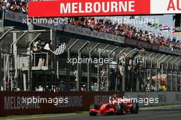 18.03.2007 Melbourne, Australia,  Fernando Alonso (ESP), McLaren Mercedes, MP4-22 takes the Chequered flag - Formula 1 World Championship, Rd 1, Australian Grand Prix, Sunday Race