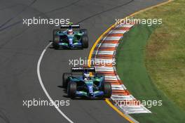 18.03.2007 Melbourne, Australia,  Jenson Button (GBR), Honda Racing F1 Team, RA107 leads Rubens Barrichello (BRA), Honda Racing F1 Team, RA107 - Formula 1 World Championship, Rd 1, Australian Grand Prix, Sunday Race