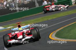 18.03.2007 Melbourne, Australia,  Ralf Schumacher (GER), Toyota Racing, TF107 and Takuma Sato (JPN), Super Aguri F1, SA07 - Formula 1 World Championship, Rd 1, Australian Grand Prix, Sunday Race