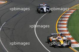 18.03.2007 Melbourne, Australia,  Heikki Kovalainen (FIN), Renault F1 Team, R27 and Nico Rosberg (GER), WilliamsF1 Team, FW29 - Formula 1 World Championship, Rd 1, Australian Grand Prix, Sunday Race