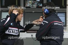 17.03.2007 Melbourne, Australia,  Sebastian Vettel (GER), Test Driver, BMW Sauber F1 Team, Beat Zehnder (CHE), BMW Sauber F1 Team, Team Manager at the pit gantry / pit wall - Formula 1 World Championship, Rd 1, Australian Grand Prix, Saturday Practice