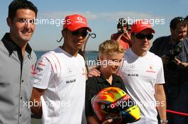 15.03.2007 Melbourne, Australia,  Lewis Hamilton (GBR), McLaren Mercedes and Fernando Alonso (ESP), McLaren Mercedes meet Chris Hays (AUS), Young racing hopeful - Vodafone and McLaren Mercedes event, Australian Grand Prix, Thursday