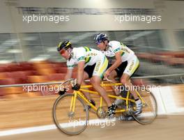 14.03.2007 Melbourne, Australia,  Mark Webber (AUS), Red Bull Racing, cycles with Shane Kelley (AUS) Australian Indoor Cyclist - Formula 1 World Championship, Rd 1, Australian Grand Prix, Wednesday