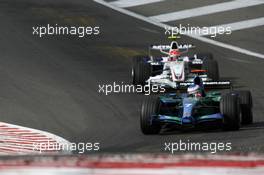 16.09.2007 Francorchamps, Belgium,  Jenson Button (GBR), Honda Racing F1 Team, RA107 leads Robert Kubica (POL), BMW Sauber F1 Team, F1.07 - Formula 1 World Championship, Rd 14, Belgium Grand Prix, Sunday Race