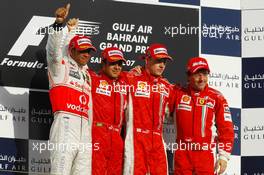 15.04.2007 Sakhir, Bahrain,  1st, Felipe Massa (BRA), Scuderia Ferrari, F2007, 2nd, Lewis Hamilton (GBR), McLaren Mercedes, MP4-22, 3rd, Kimi Raikkonen (FIN), Räikkönen, Scuderia Ferrari, F2007 and Luca Baldisserri (ITA), Head of Trackside Operations - Formula 1 World Championship, Rd 3, Bahrain Grand Prix, Sunday Podium