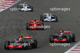 15.04.2007 Sakhir, Bahrain,  Lewis Hamilton (GBR), McLaren Mercedes, MP4-22 and Fernando Alonso (ESP), McLaren Mercedes, MP4-22 - Formula 1 World Championship, Rd 3, Bahrain Grand Prix, Sunday Race