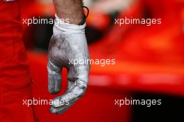 23.02.2007 Sakhir, Bahrain,  The dirty glove from a Scuderia Ferrari mechanic - Formula 1 Testing