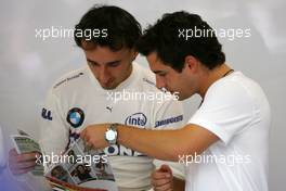 19.10.2007 Sao Paulo, Brazil,  Robert Kubica (POL),  BMW Sauber F1 Team , Timo Glock (GER), Test Driver, BMW Sauber F1 Team - Formula 1 World Championship, Rd 17, Brazilian Grand Prix, Friday Practice