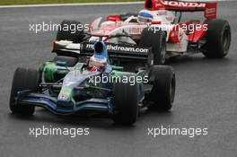 19.10.2007 Sao Paulo, Brazil,  Jenson Button (GBR), Honda Racing F1 Team, RA107 and Anthony Davidson (GBR), Super Aguri F1 Team, SA07 - Formula 1 World Championship, Rd 17, Brazilian Grand Prix, Friday Practice